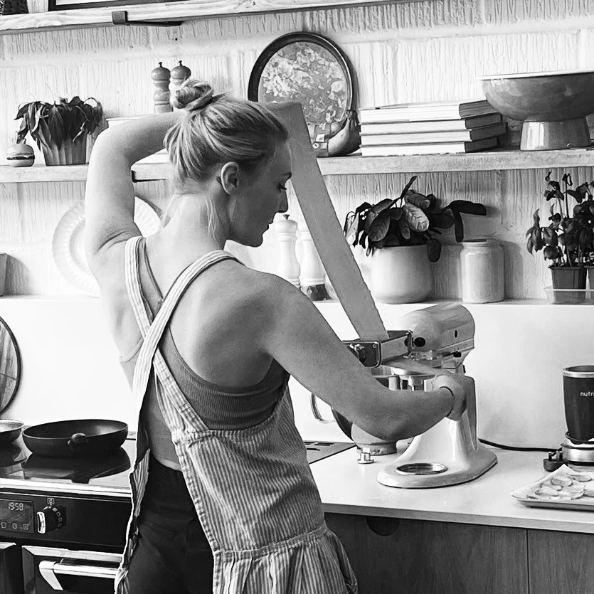 Pip Reid-Redmond, food stylist and chef, working in a kitchen